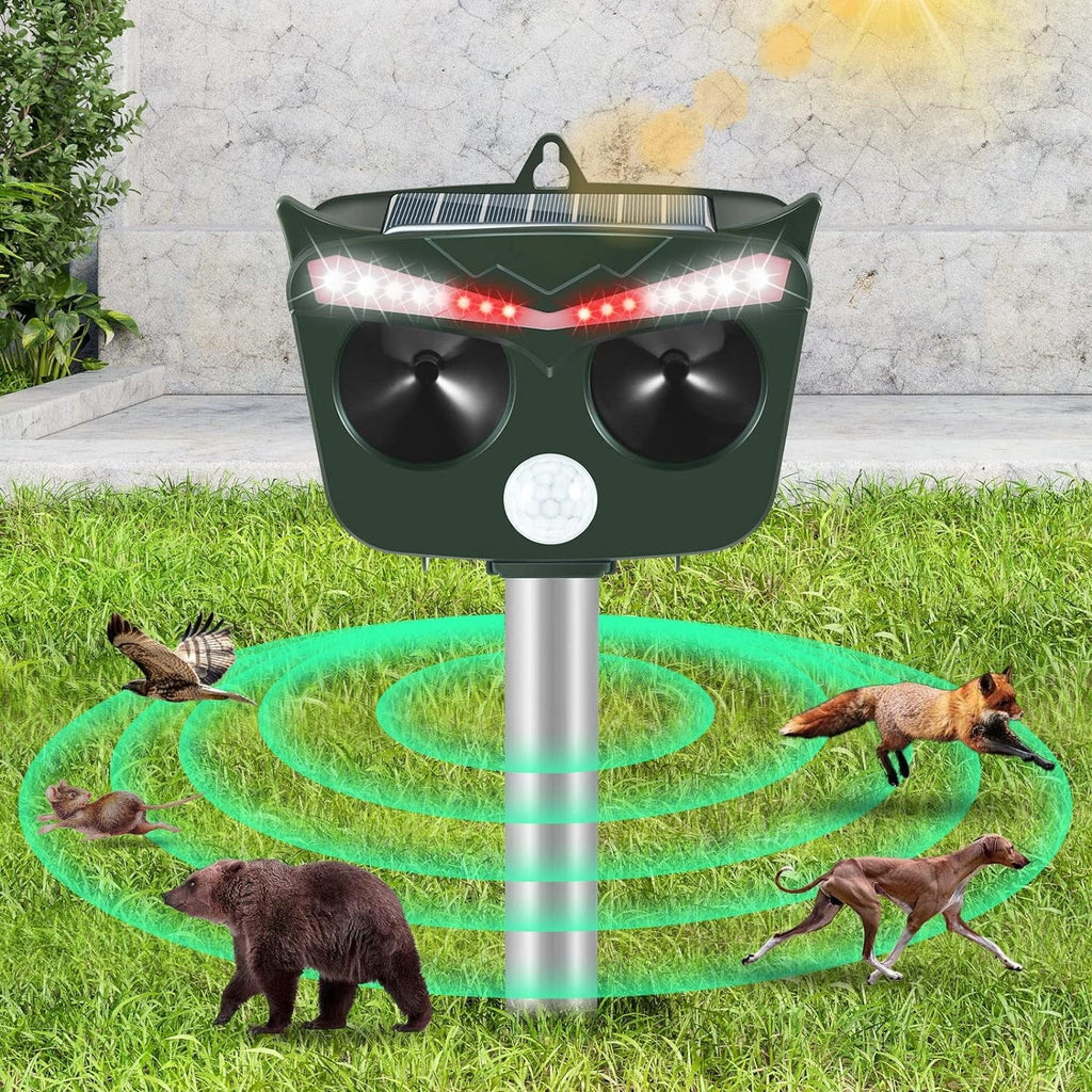 Jinyi solar animal repeller: black solar animal repeller on stake.
