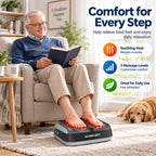 Shiatsu foot massager with heat: man using massager beside sofa.