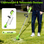 Green cordless trimmer: operator holding extended trimmer.
