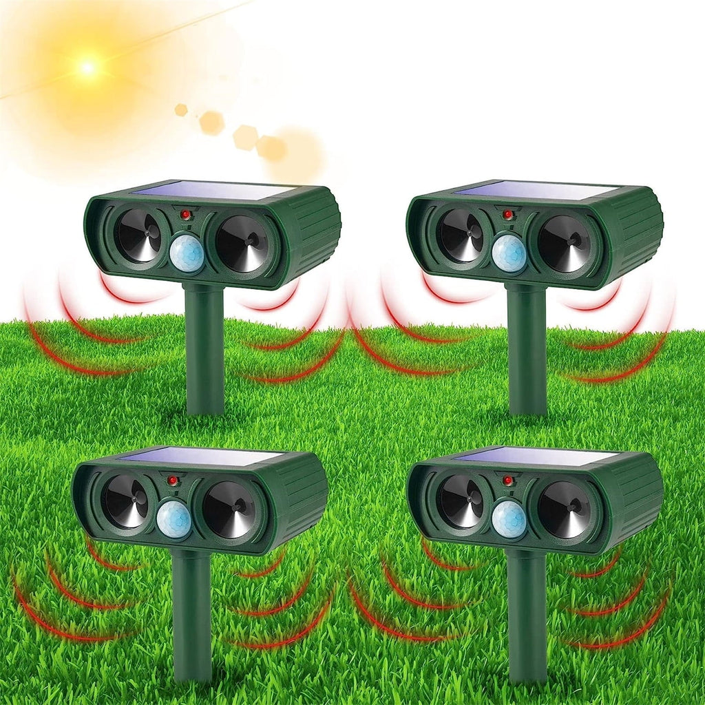Solar animal repeller 4 pack: four green solar animal repellers.