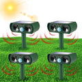 Solar animal repeller 4 pack: four green solar animal repellers.
