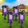 Solar bug zapper lantern: four black lantern-style solar zappers.