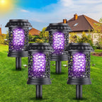 Solar bug zapper lantern: four black lantern-style solar zappers.