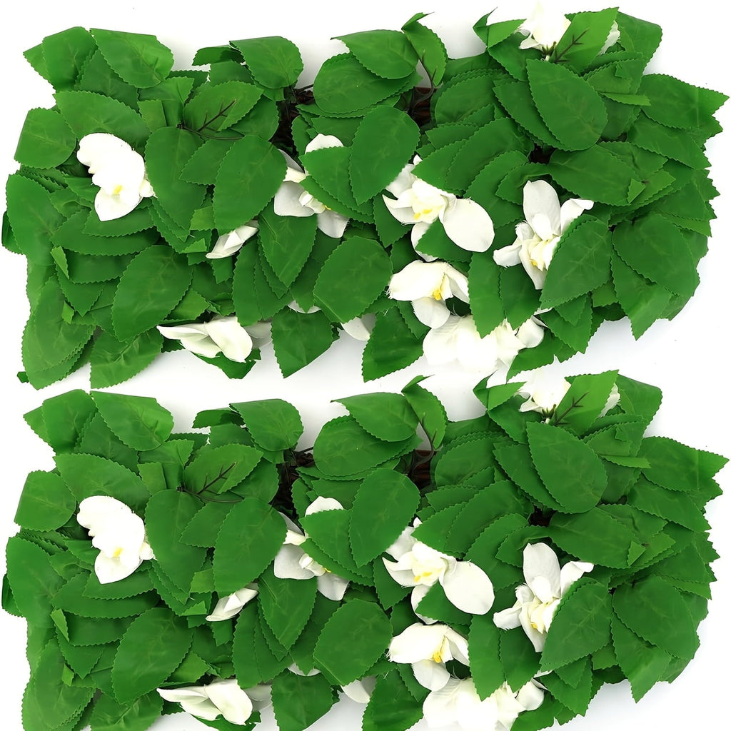 Expandable ivy privacy fence: white-flowered screen in expanded position.