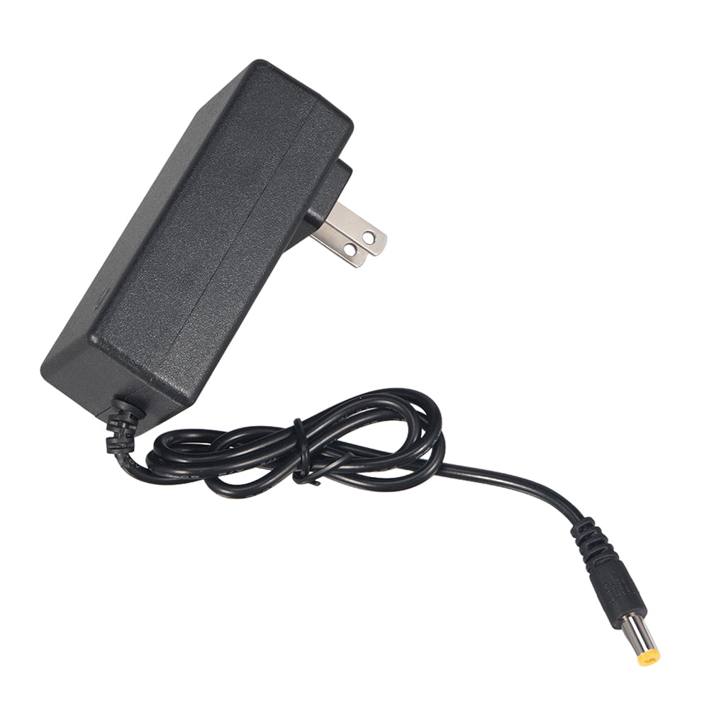 Brush cutter blade kit: charger and power-cord close-up.