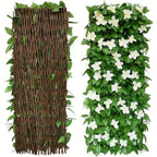 Expandable ivy privacy fence: artificial ivy trellis with white flowers.