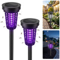 Solar bug zapper torch: two black solar zapper torches.