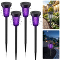 Solar bug zapper torches: four black solar zapper torches.