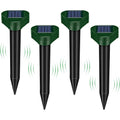 Solar mole repeller 4 pack: four square-top solar deterrent stakes.