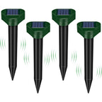 Solar mole repeller 4 pack: four square-top solar deterrent stakes.